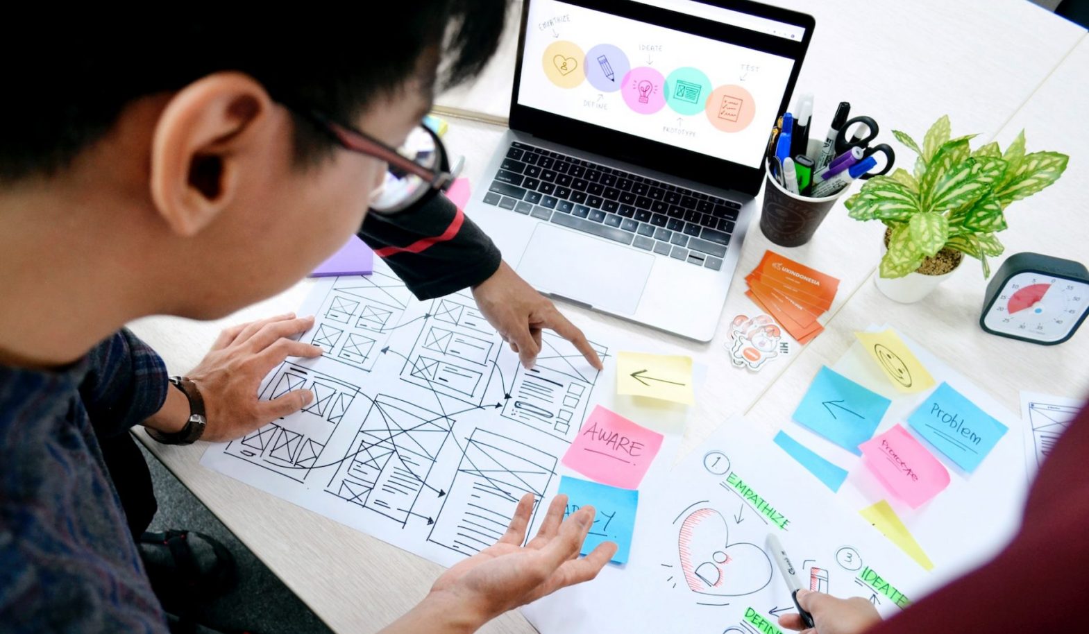 Employee working on diagrams and processes