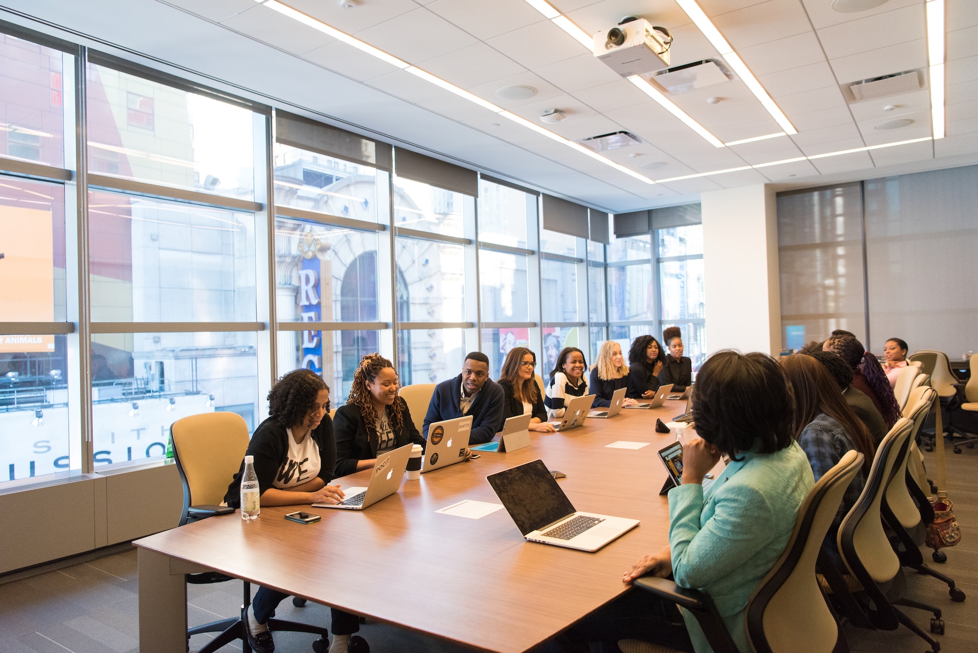 Group of coworkers sitting at a conference table for a meeting