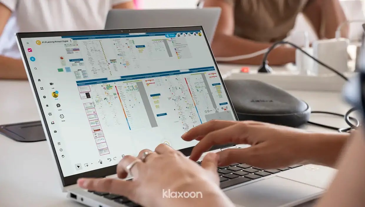 A person working remotely on a computer displaying a PI Planning Board. | Klaxoon 