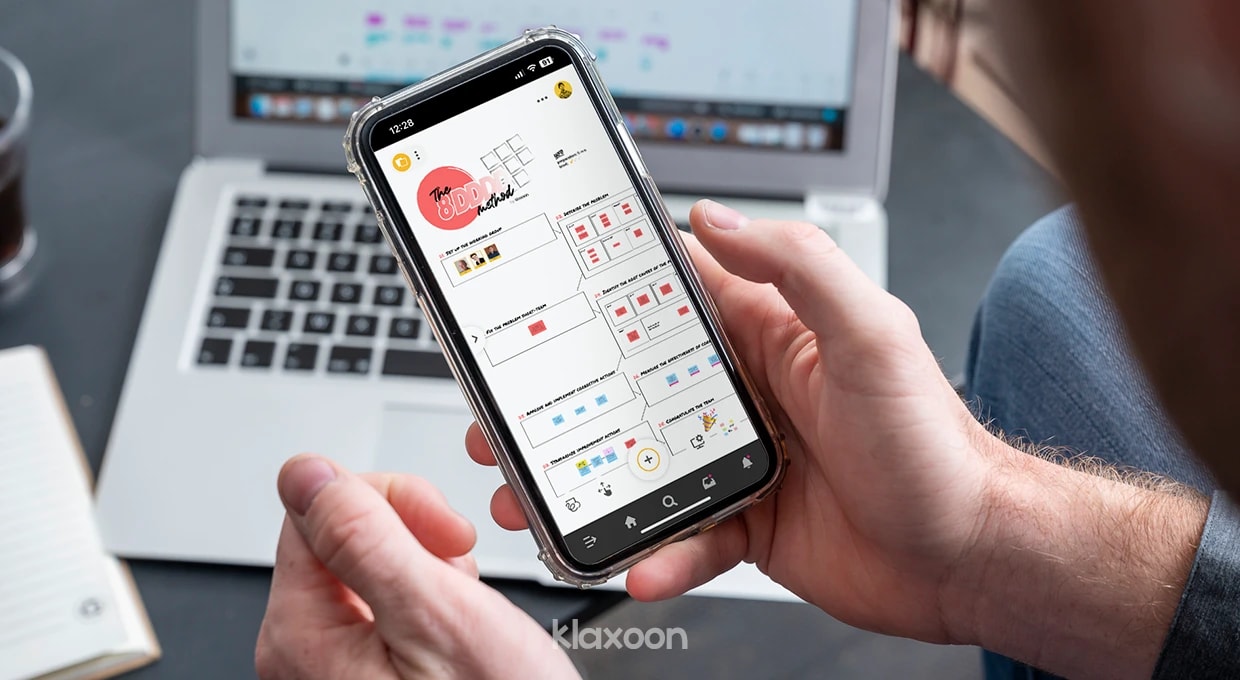 A person working on a smartphone displaying the 8D template completed as part of a training course. | Klaxoon