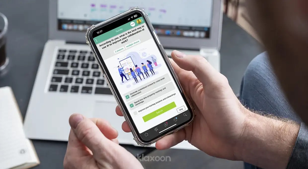 A person completing a Survey on a mobile phone. | Klaxoon