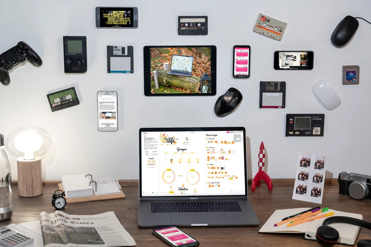 Business team collaborating in hybrid meeting with on-site attendees and remote participants.