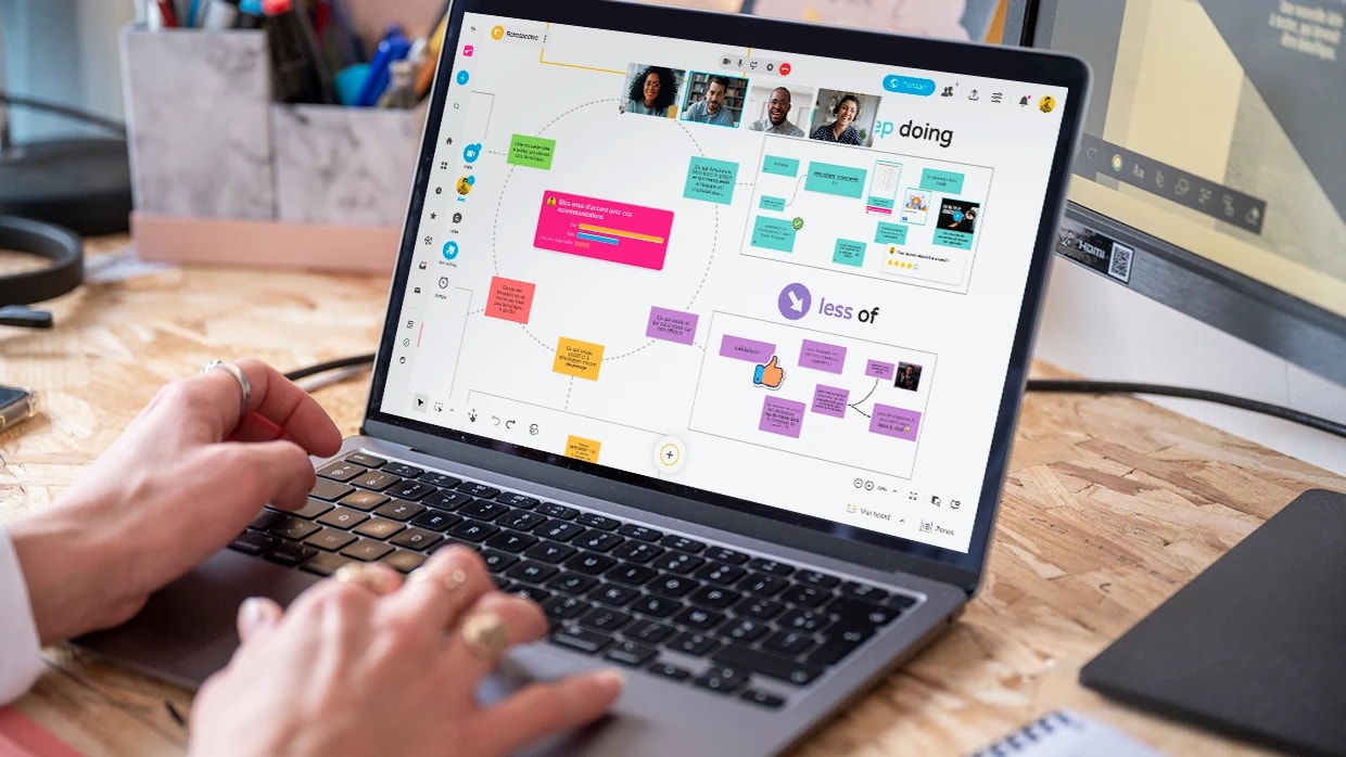 Collaborative whiteboard with color-coded cards, connecting arrows, chat bubbles and user avatars.