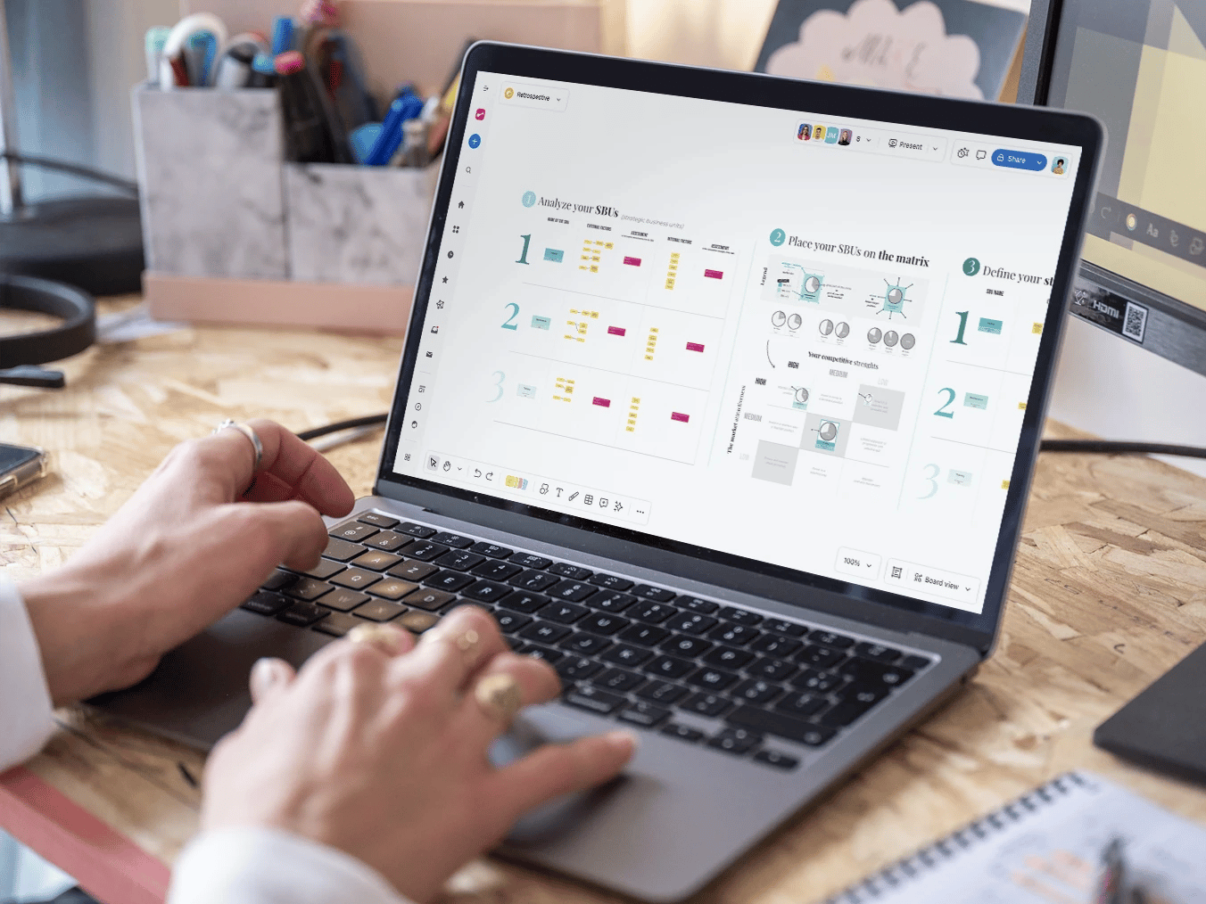 Team collaborating around a decision tree workflow diagram.