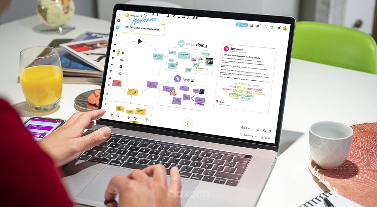 A person working on a computer displaying a Retrospective Board where many ideas are shared, and then summarized using text and a word cloud. | Klaxoon