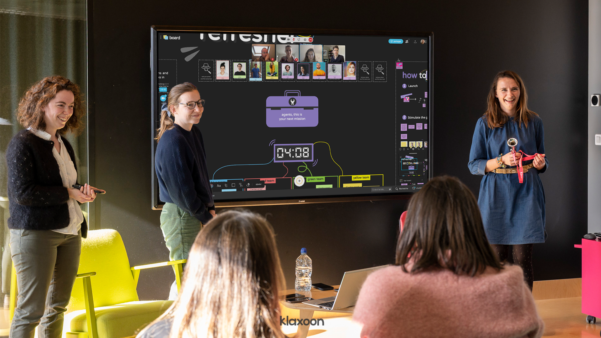 A training team using Code 408 Refresher on a giant screen, on site and remotely