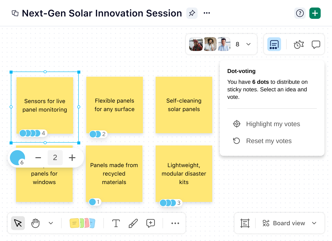 Interactive whiteboard with dot voting on task cards.