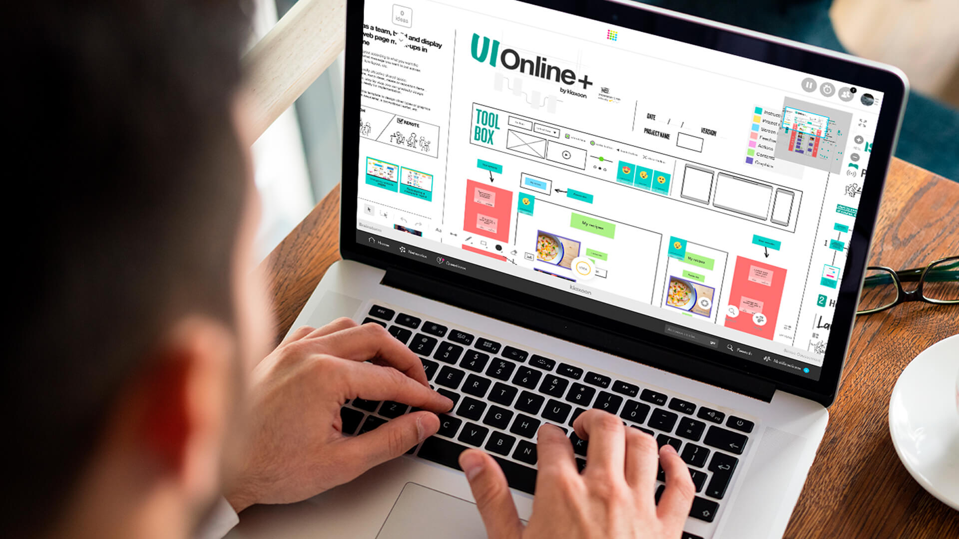 A person working on a computer that displays the UI Online template on a Board. | Klaxoon