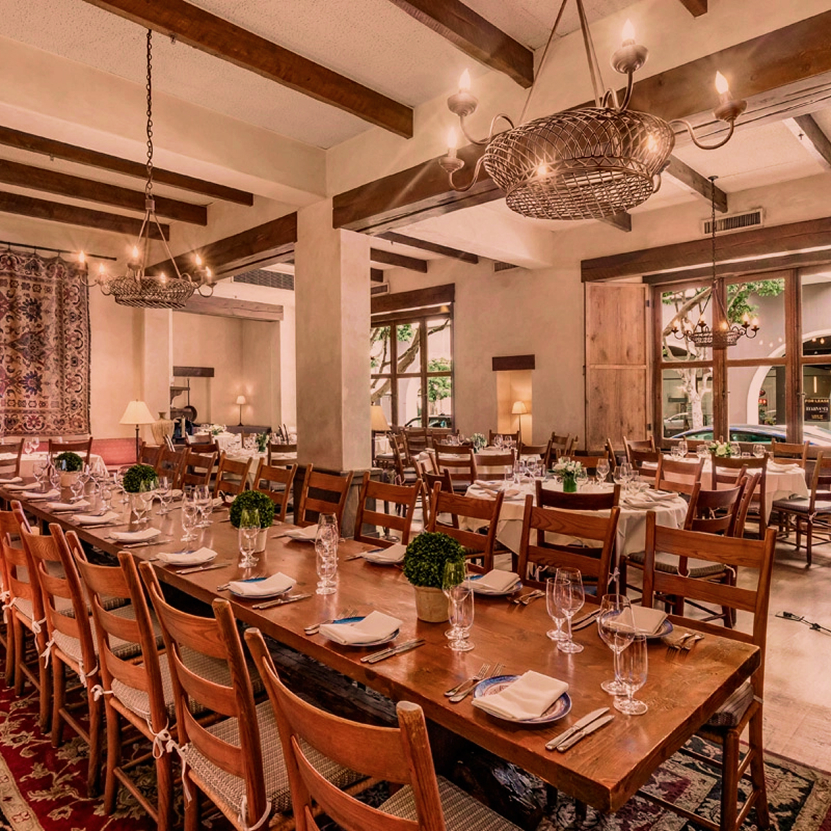 Storefront of Kokkari Estiatorio restaurant with Mediterranean architecture.